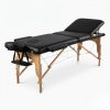 Adjustable backrest of the MASTER Tilt Portable Massage Bed showing the sturdy wooden frame and black PVC upholstery.
