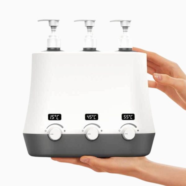 Illustration of 360-degree surrounding heating technology in a triple bottle massage oil heater.