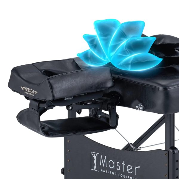 A close-up of the headrest and top section of a black portable massage table, showing blue glowing airbags activated to demonstrate the 3D lumbar traction feature.
